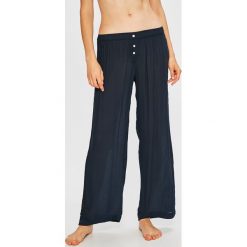 Tommy Hilfiger - Spodnie piżamowe. Niebieskie piżamy damskie TOMMY HILFIGER, s, bez wzorów, z wiskozy, bez rękawów. W wyprzedaży za 139,90 zł.