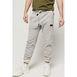 O'Neill Spodnie dresowe Szary Wielokolorowy. Szare spodnie męskie O'Neill, xxl, bez wzorów, z elastanu. Za 309,95 zł.