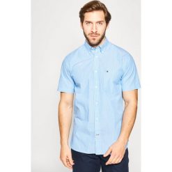 Koszula TOMMY HILFIGER MW0MW12804. Niebieskie koszule męskie TOMMY HILFIGER, m, bez wzorów, z bawełny, casualowe, bez kołnierzyka, bez rękawów. Za 299,00 zł.