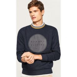 Bluza z fantazyjnym ściągaczem - Granatowy. Niebieskie bluzy męskie rozpinane Reserved, l. Za 99,99 zł.
