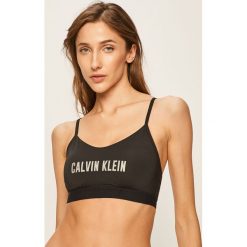 Calvin Klein Performance - Biustonosz sportowy. Różowe biustonosze sportowe damskie Calvin Klein Performance, s, z nadrukiem, z elastanu. Za 199,90 zł.