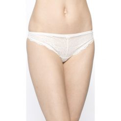 Triumph - Stringi Forbidden. Białe stringi damskie marki Triumph, l, z elastanu. W wyprzedaży za 39,90 zł.