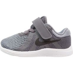 Nike Performance REVOLUTION 4 Obuwie do biegania treningowe dark grey/black/cool grey/white. Szare buty damskie do biegania marki Nike Performance, z tworzywa sztucznego. Za 129,00 zł.