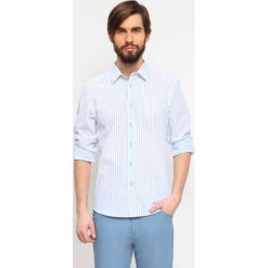 KOSZULA DŁUGI RĘKAW MĘSKA. Białe koszule męskie Top Secret, m, w paski, eleganckie, bez kołnierzyka, z długim rękawem. W wyprzedaży za 49,99 zł.