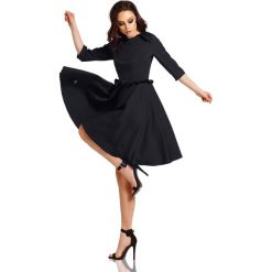 Kobieca sukienka z falbankami L291 czarny czarny. Czarne sukienki dziewczęce Tagless, bez wzorów, eleganckie, bez rękawów, rozkloszowane. Za 159,90 zł.
