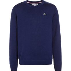 Lacoste Sweter methylene. Niebieskie swetry dziewczęce Lacoste, z wełny. W wyprzedaży za 263,20 zł.