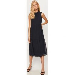 Vero Moda - Sukienka. Niebieskie sukienki damskie Vero Moda, na co dzień, s, bez wzorów, z poliesteru, casualowe, z okrągłym kołnierzem, bez rękawów, mini, rozkloszowane. W wyprzedaży za 149,90 zł.