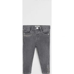Mango Kids - Jeansy dziecięce Jules 80-104 cm. Szare jeansy dziewczęce Mango Kids, z haftami, z elastanu. W wyprzedaży za 63,90 zł.