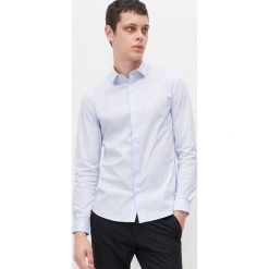 Koszula super slim fit -. Koszule męskie Reserved, s, bez wzorów, bez kołnierzyka, bez rękawów. Za 99,99 zł.