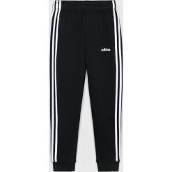 Adidas - Spodnie dziecięce 140-176 cm. Czarne dresy chłopięce Adidas, z bawełny. W wyprzedaży za 119,90 zł.