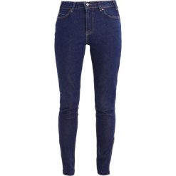 Levi's® 721 VINTAGE HIGH SKINNY Jeans Skinny Fit indigo superstition. Niebieskie jeansy damskie marki Levi's®, z bawełny. W wyprzedaży za 224,50 zł.