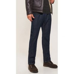 Jeansy regular classic - Granatowy. Niebieskie jeansy męskie marki House. Za 99,99 zł.