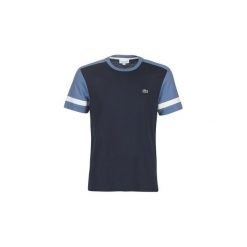 T-shirty z krótkim rękawem Lacoste TH8617. Niebieskie t-shirty męskie Lacoste, s, bez wzorów, bez kołnierzyka, krótkie. Za 289,00 zł.