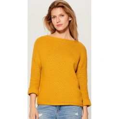Pleciony sweter oversize - Żółty. Żółte swetry damskie Mohito, s, bez wzorów, bez rękawów, bez kaptura. W wyprzedaży za 59,99 zł.