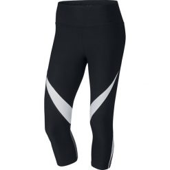 Legginsy sportowe damskie: legginsy damskie 3/4 NIKE POWER LEGENDARY CAPRI FBRIC TWIST / 833326-010