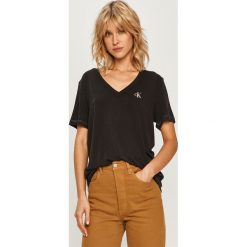 Calvin Klein Jeans - T-shirt. Czarne t-shirty damskie Calvin Klein Jeans, s, bez wzorów, z elastanu, casualowe, bez kołnierzyka. Za 179,90 zł.