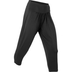 Spodnie sportowe haremki funkcyjne, dł. 7/8 bonprix czarny. Czarne spodnie damskie bonprix, bez wzorów. Za 32,99 zł.