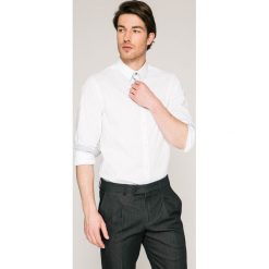 Guess Jeans - Koszula. Niebieskie koszule męskie marki Guess Jeans, s, z aplikacjami, z bawełny, klasyczne, z klasycznym kołnierzykiem, z długim rękawem. W wyprzedaży za 199,90 zł.