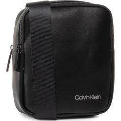 Saszetka CALVIN KLEIN - Ck United Pu 2G Mini Reporter K50K505521 BAX. Czarne torby męskie skórzane Calvin Klein, bez wzorów, ze skóry ekologicznej, młodzieżowe. W wyprzedaży za 249,00 zł.