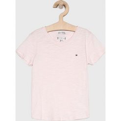 Tommy Hilfiger - Top dziecięcy 104-176 cm. Różowe bluzki dziewczęce TOMMY HILFIGER, bez wzorów, z bawełny, z okrągłym kołnierzem, z krótkim rękawem, krótkie, bez kaptura. Za 89,90 zł.