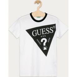 Guess Jeans - T-shirt dziecięcy 116-175 cm. Białe t-shirty chłopięce Guess Jeans, z nadrukiem, z bawełny, bez rękawów. Za 119,90 zł.