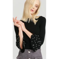 Czarny Sweter Chimera. Czarne swetry damskie other, bez wzorów, casualowe, bez rękawów, bez kaptura. Za 39,99 zł.