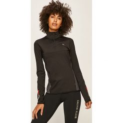 Calvin Klein Performance - Bluza. Czarne bluzy damskie Calvin Klein Performance, s, bez wzorów, z elastanu, z krótkim rękawem, krótkie, bez kaptura. Za 499,90 zł.