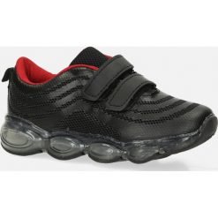 Czarne buty sportowe na rzep casu 788-a. Czarne buty dziewczęce sportowe Casu, bez wzorów, bez zapięcia. Za 49,99 zł.