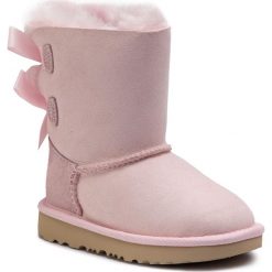 Buty UGG - T Bailey Bow II 1017394T T/Slpn. Różowe śniegowce dziewczęce marki Ugg, bez zapięcia. W wyprzedaży za 379,00 zł.