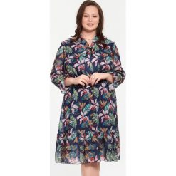 Szyfonowa kolorowa sukienka Magdalena w kwiaty XXL OVERSIZE. Sukienki damskie Moda Size Plus Iwanek, na imprezę, na lato, xxl, w kwiaty, z elastanu, eleganckie, z klasycznym kołnierzykiem, bez rękawów, oversize. Za 209,00 zł.