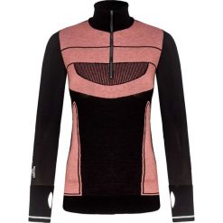 T-shirt ADIDAS BY STELLA McCARTNEY. Różowe topy damskie adidas by Stella McCartney, z nadrukiem, z wełny, z golfem. W wyprzedaży za 424,00 zł.