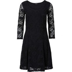 Sukienka z koronką bonprix czarny. Czarne sukienki damskie bonprix, na imprezę, w koronkowe wzory, z materiału, z okrągłym kołnierzem, bez rękawów, rozkloszowane. Za 129,99 zł.