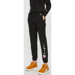Champion - Spodnie. Czarne spodnie damskie Champion, xs, bez wzorów, z elastanu. W wyprzedaży za 239,90 zł.