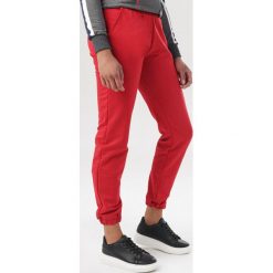 Czerwone Spodnie Felyera. Czerwone spodnie damskie Born2be, xl, z dresówki. Za 69,99 zł.