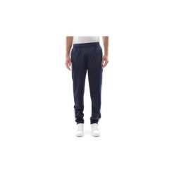 Spodnie treningowe Fila 684379 REGGIR TRACK PANT. Niebieskie spodnie męskie Fila, s, bez wzorów. Za 296,88 zł.
