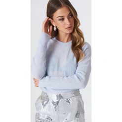 NA-KD Luźny melanżowy sweter z dzianiny - Blue. Niebieskie swetry oversize damskie marki NA-KD, z wełny. W wyprzedaży za 48,78 zł.