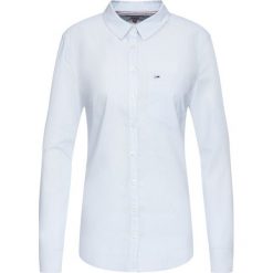 Koszula Tommy Jeans Poplin DW0DW07250. Fioletowe bluzki damskie Tommy Jeans, l, bez wzorów, z bawełny, bez kołnierzyka, bez rękawów. W wyprzedaży za 199,00 zł.