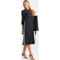 SUKIENKA liu jo sport. Czarne sukienki damskie Liu Jo Sport, na imprezę, xl, bez wzorów, z materiału, sportowe, bez kołnierzyka, bez rękawów, maxi, sportowe. Za 629,10 zł.