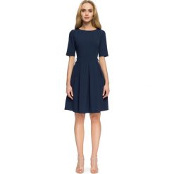 TALLIS Sukienka z kontrafałdą - granatowa. Niebieskie sukienki damskie Stylove, s, w paski, z tkaniny, bez kołnierzyka, bez rękawów, rozkloszowane. Za 159,00 zł.