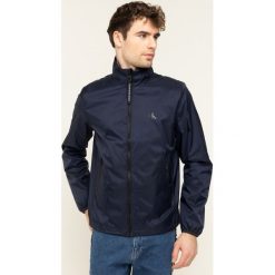 Kurtka przejściowa Calvin Klein Jeans Nylon Harrington J30J314058. Niebieskie kurtki męskie Calvin Klein Jeans, s, bez wzorów, z jeansu, bez kaptura. W wyprzedaży za 459,00 zł.