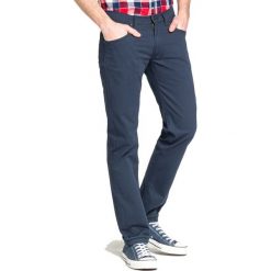 LEE DAREN ZIP FLY > L707SC37. Żółte spodnie męskie Lee, na lato, m, z aplikacjami, z elastanu, retro, długie. W wyprzedaży za 219,99 zł.