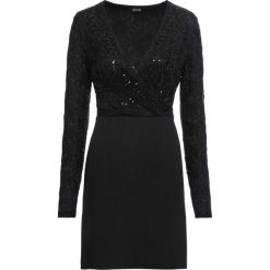 Sukienka z koronką bonprix czarny. Czarne sukienki damskie bonprix, w koronkowe wzory, z materiału, z dekoltem w serek, bez rękawów, kopertowe. Za 149,99 zł.