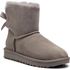 Buty UGG - W Mini Bailey Bow II 1016501 W/Sel. Szare kozaki damskie marki Ugg, na zimę, ze skóry, bez obcasa, bez zapięcia. W wyprzedaży za 549,00 zł.