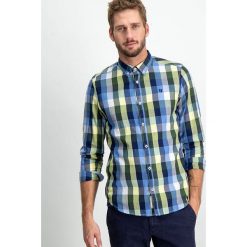 Koszula w kolorze niebiesko-żółtym. Żółte koszule męskie Garcia, xl, w kratkę, z bawełny, button down, bez rękawów. W wyprzedaży za 59,95 zł.