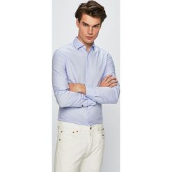 Guess Jeans - Koszula. Niebieskie koszule męskie Guess Jeans, xl, z aplikacjami, z bawełny, z włoskim kołnierzykiem, z długim rękawem. W wyprzedaży za 179,90 zł.