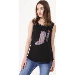 Czarna Bluzka Breathy. Bluzki damskie Born2be. Za 19,99 zł.