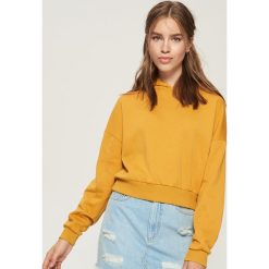 Krótka bluza z kapturem - Żółty. Żółte bluzy rozpinane damskie Sinsay, l, z krótkim rękawem, krótkie, z kapturem. Za 49,99 zł.