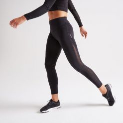 Legginsy fitness kardio damskie 900 czarne. Czarne legginsy sportowe damskie DOMYOS, s, w paski, z elastanu, na fitness i siłownię. Za 99,99 zł.